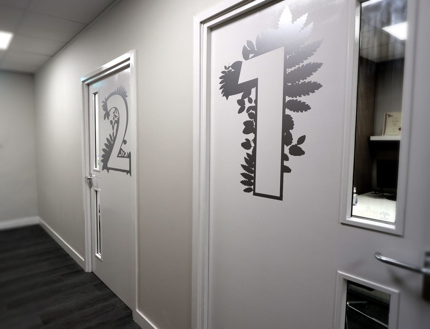 Your Hearing Consultants Examination room door number graphics