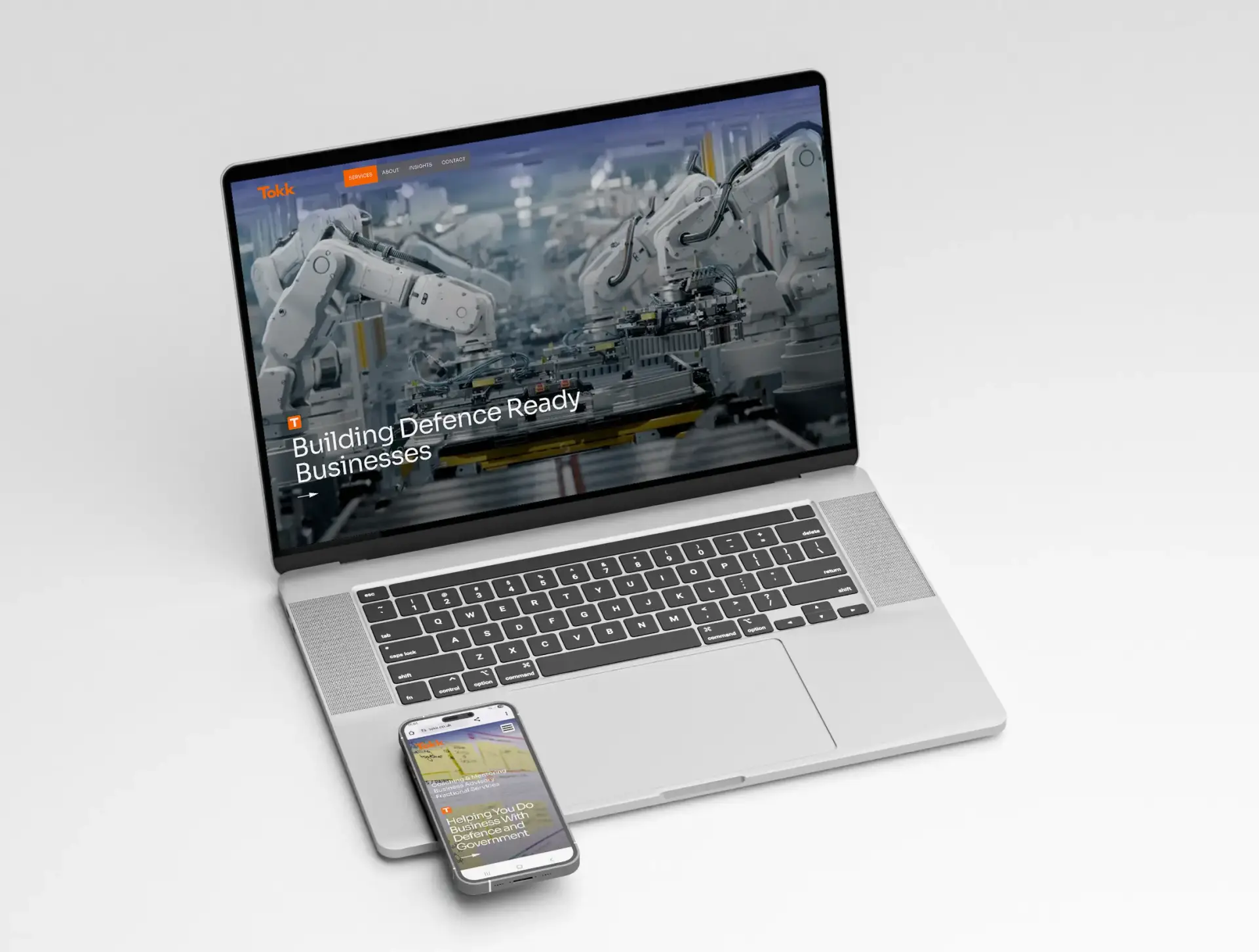 Tokk homepage displayed on a laptop and mobile phone